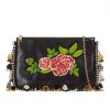 the front of Rose Embroidered Pom Pom Clutch Bag